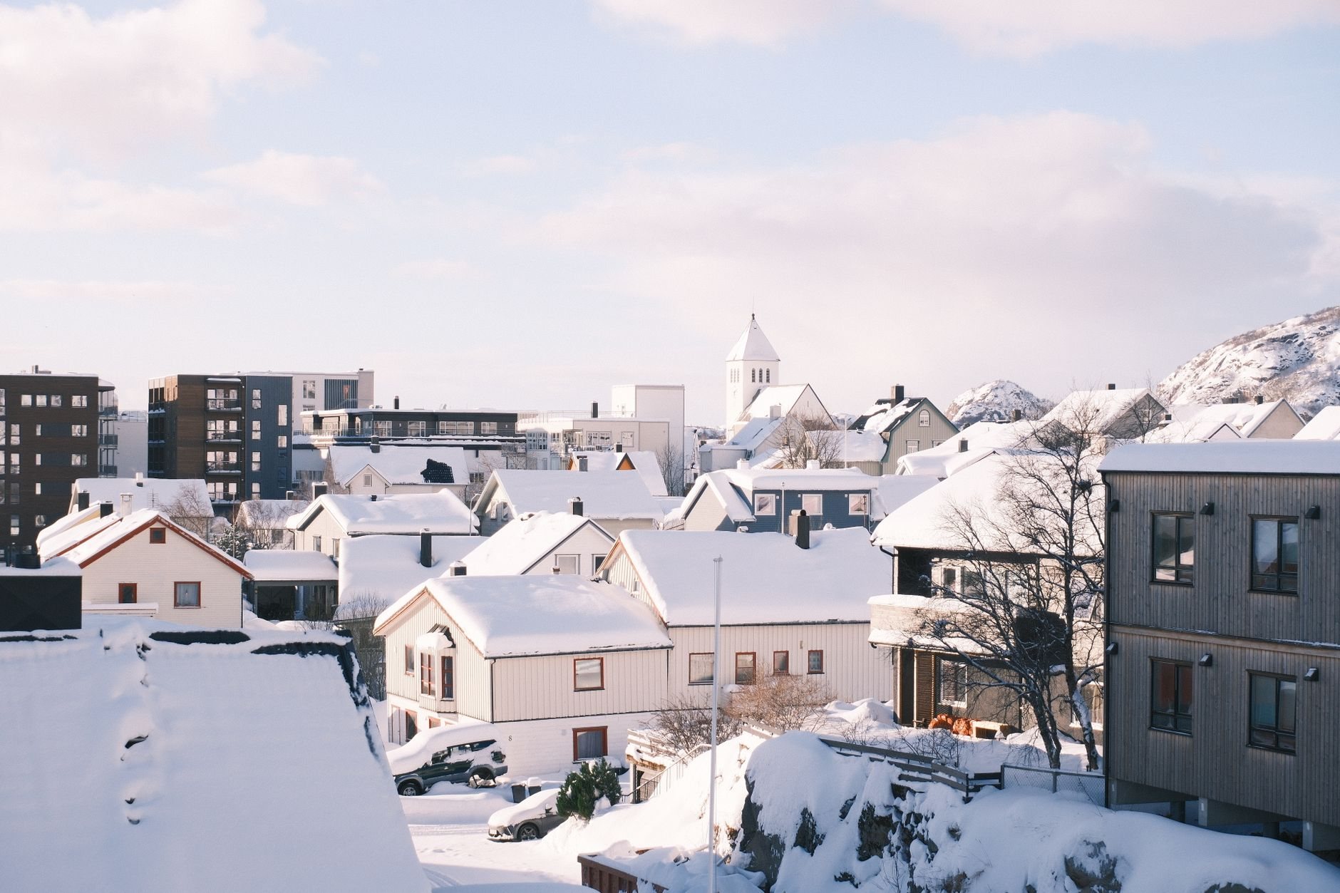 Snow-covered bench neighborhood in winter below the Wasatch foothills