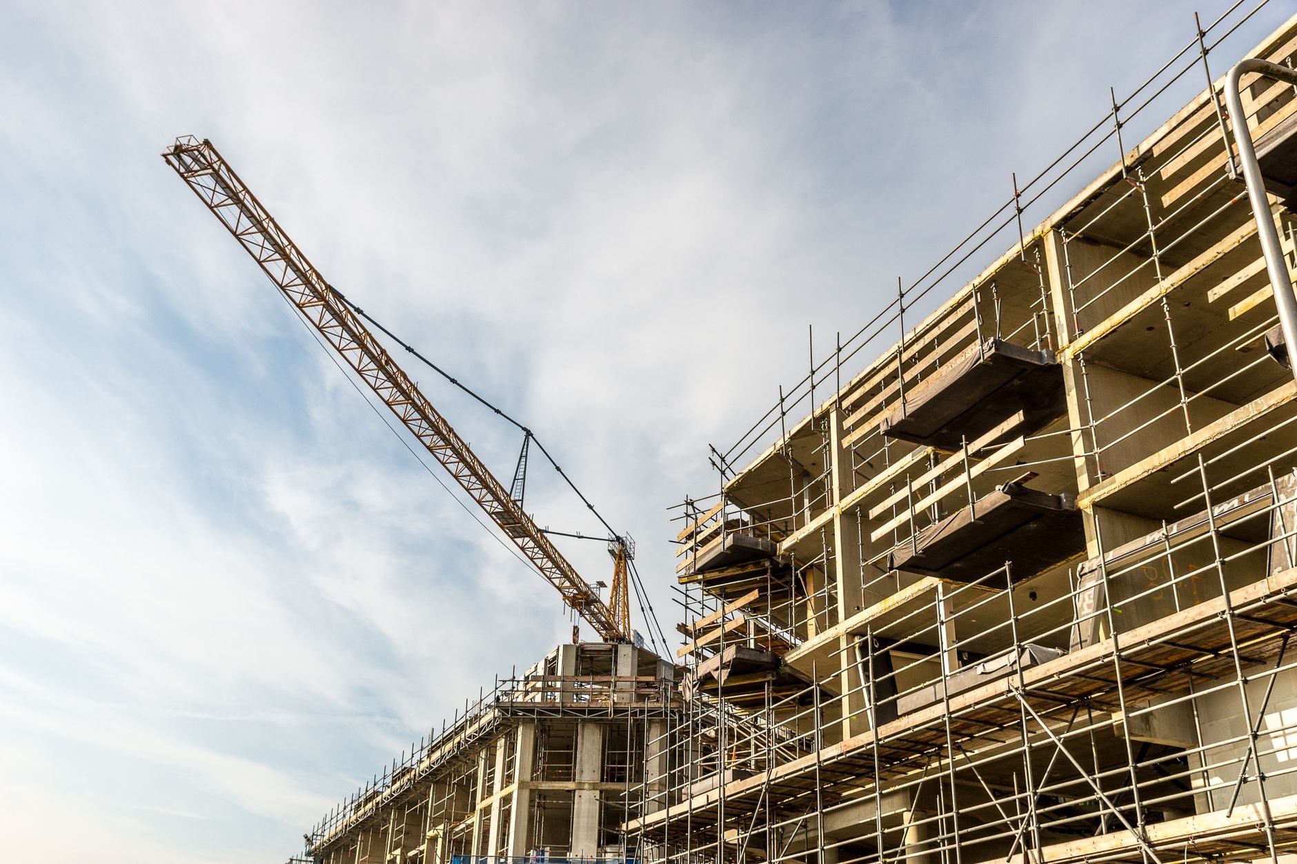 Commercial building under construction with steel and concrete work