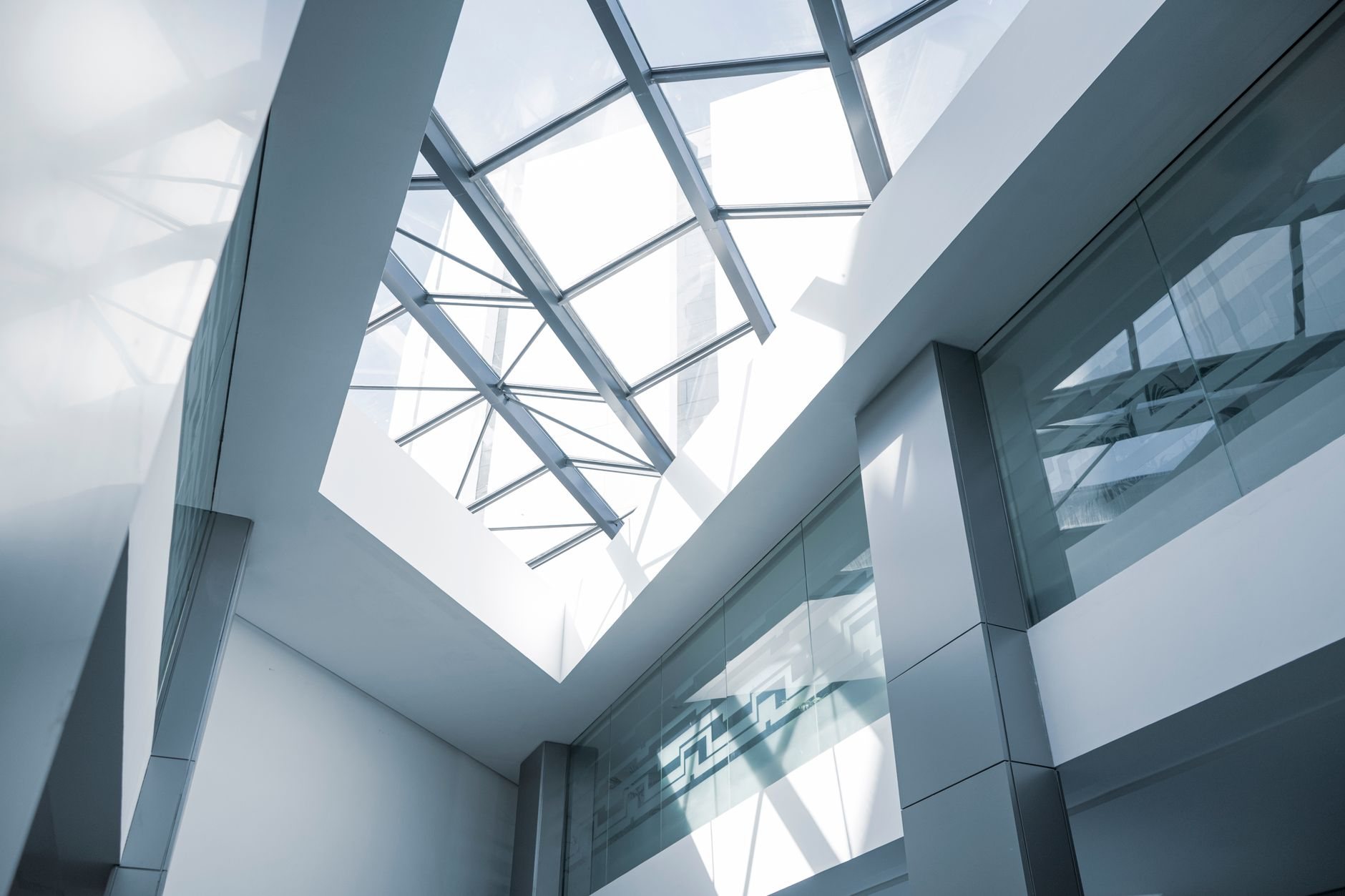 Finished modern office interior with glass ceiling and steel framing