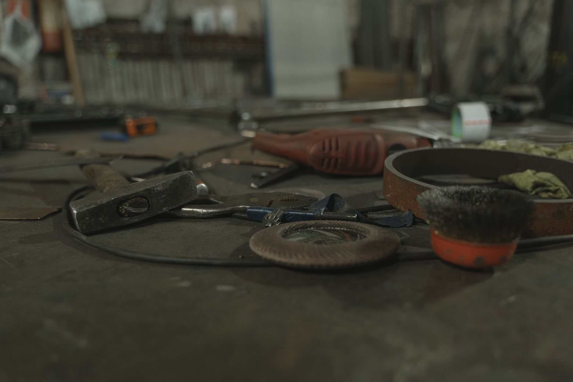 Installation tools laid out on a workbench before a fixture and hardware visit