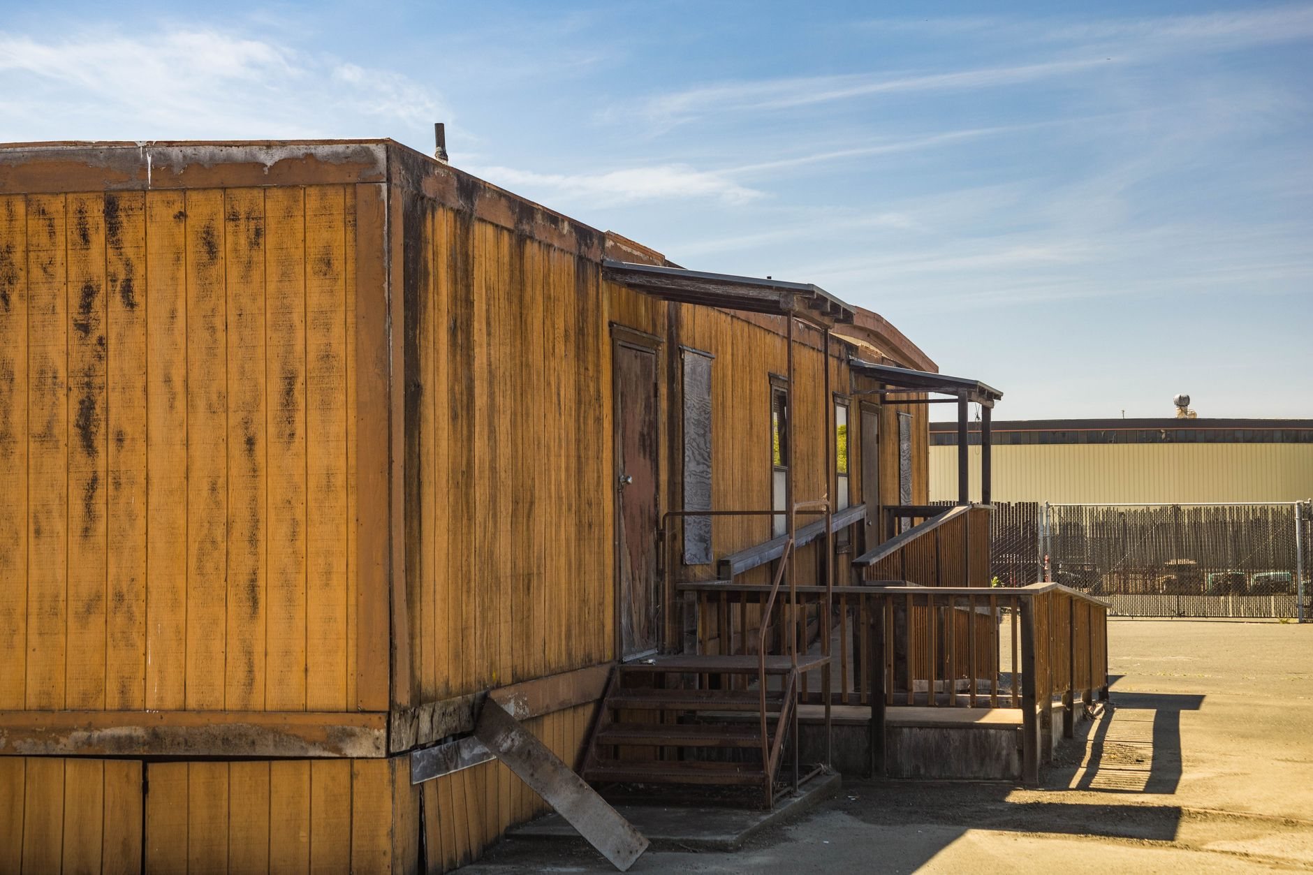 Building openings secured with board-up after damage