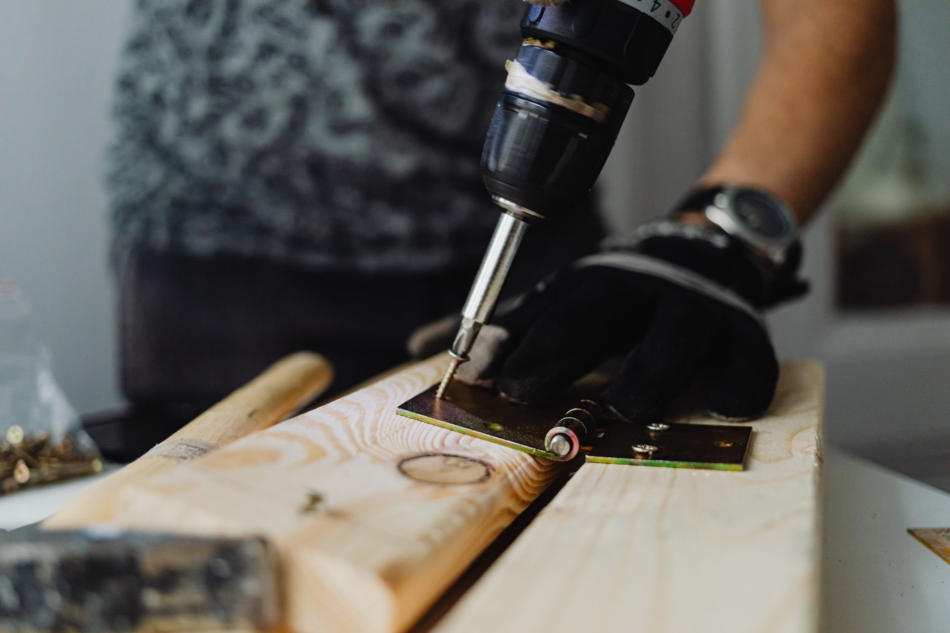 Handyman repair work with drill and tools