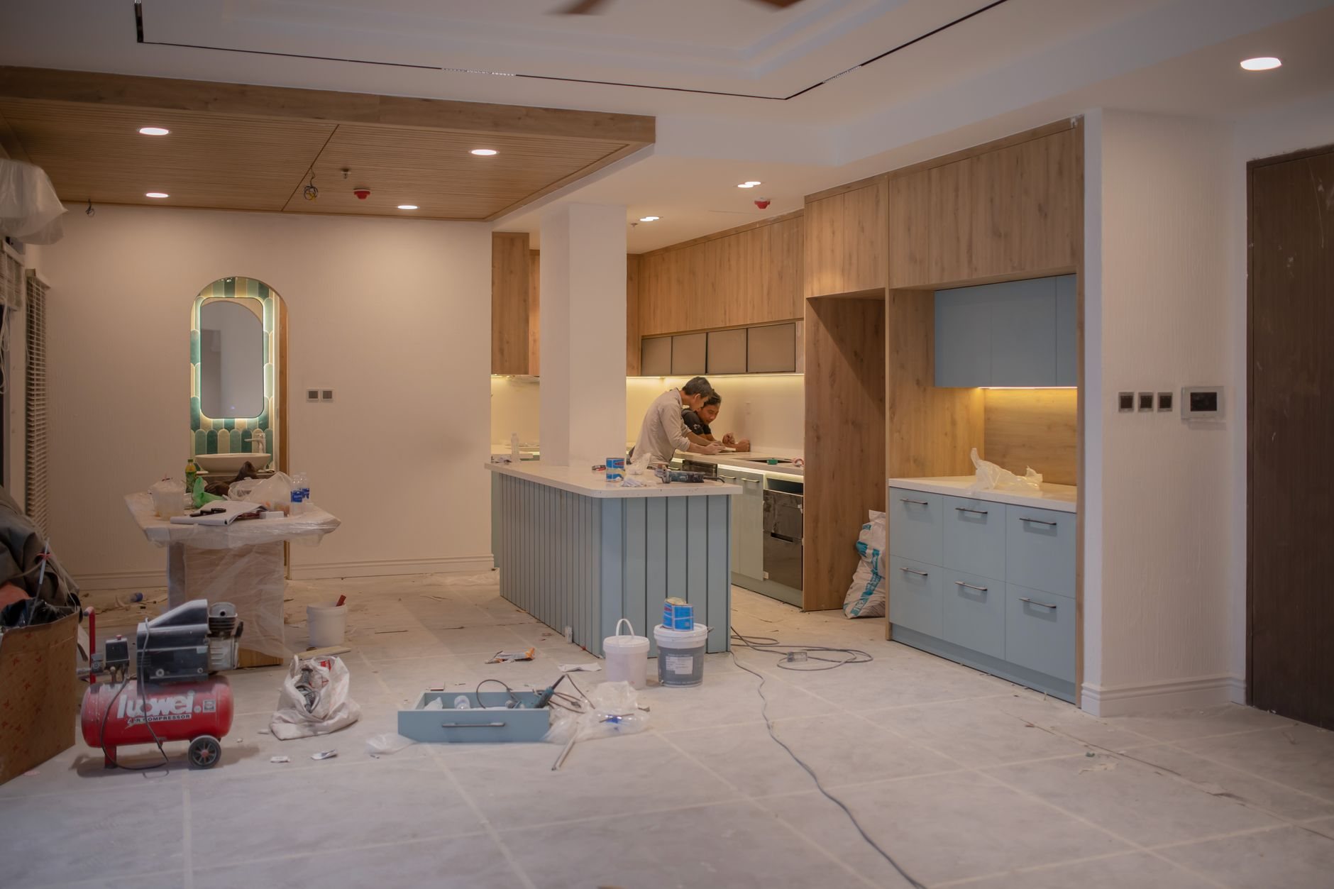 Kitchen remodel in progress with new cabinetry being installed