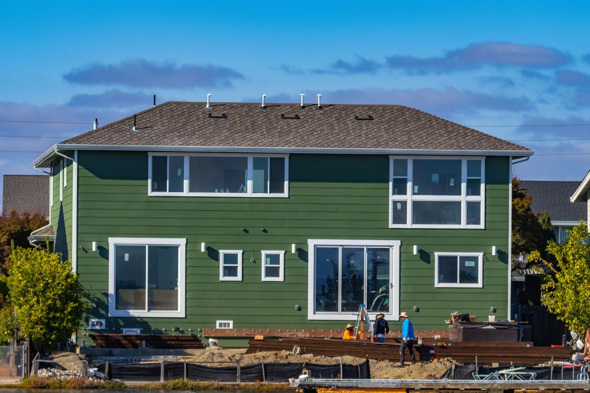 Installing new siding on a home exterior