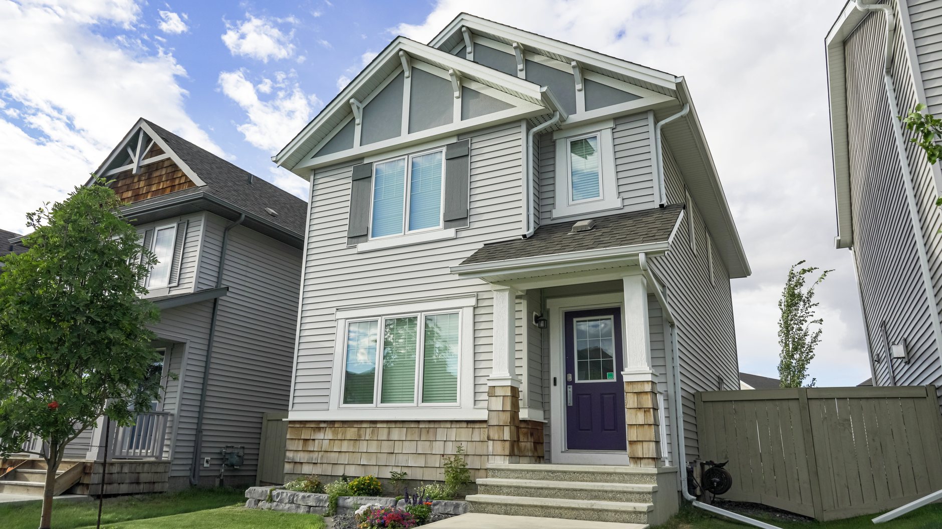 Utah home with freshly installed lap siding on a clear day